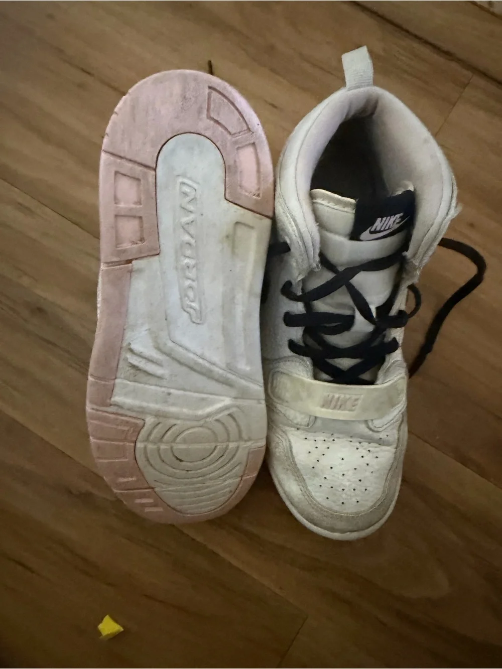 Nike Kids size 3 White and Black High-Top Sneakers with Pink Sole Accents
